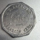 Kansas, Peabody L. D. Kneeland Aluminum Good For 25¢ Merchandise Token 210887 — photo 1