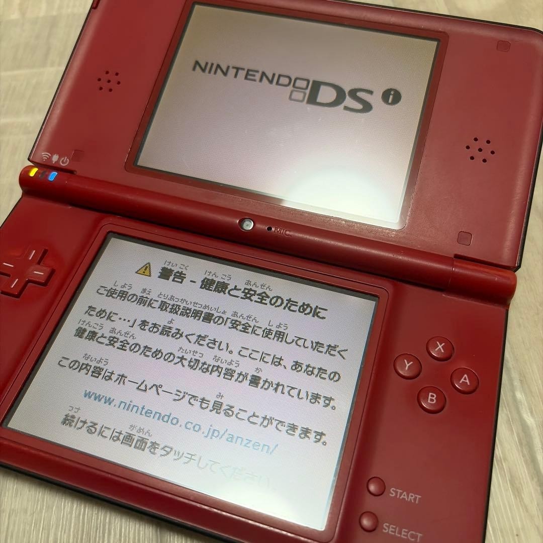 Nintendo DSi XL 25th Anniversary Edition with New Mario Bros. Red