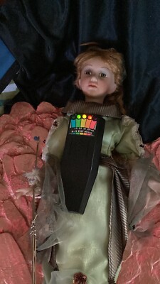 Lauren, porcelain doll. High EMFs haunted green-witch protective circle/pendulum