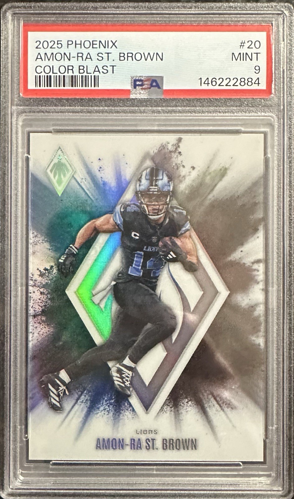 2025 Panini Phoenix Amon-Ra St. Brown Color Blast PSA 9