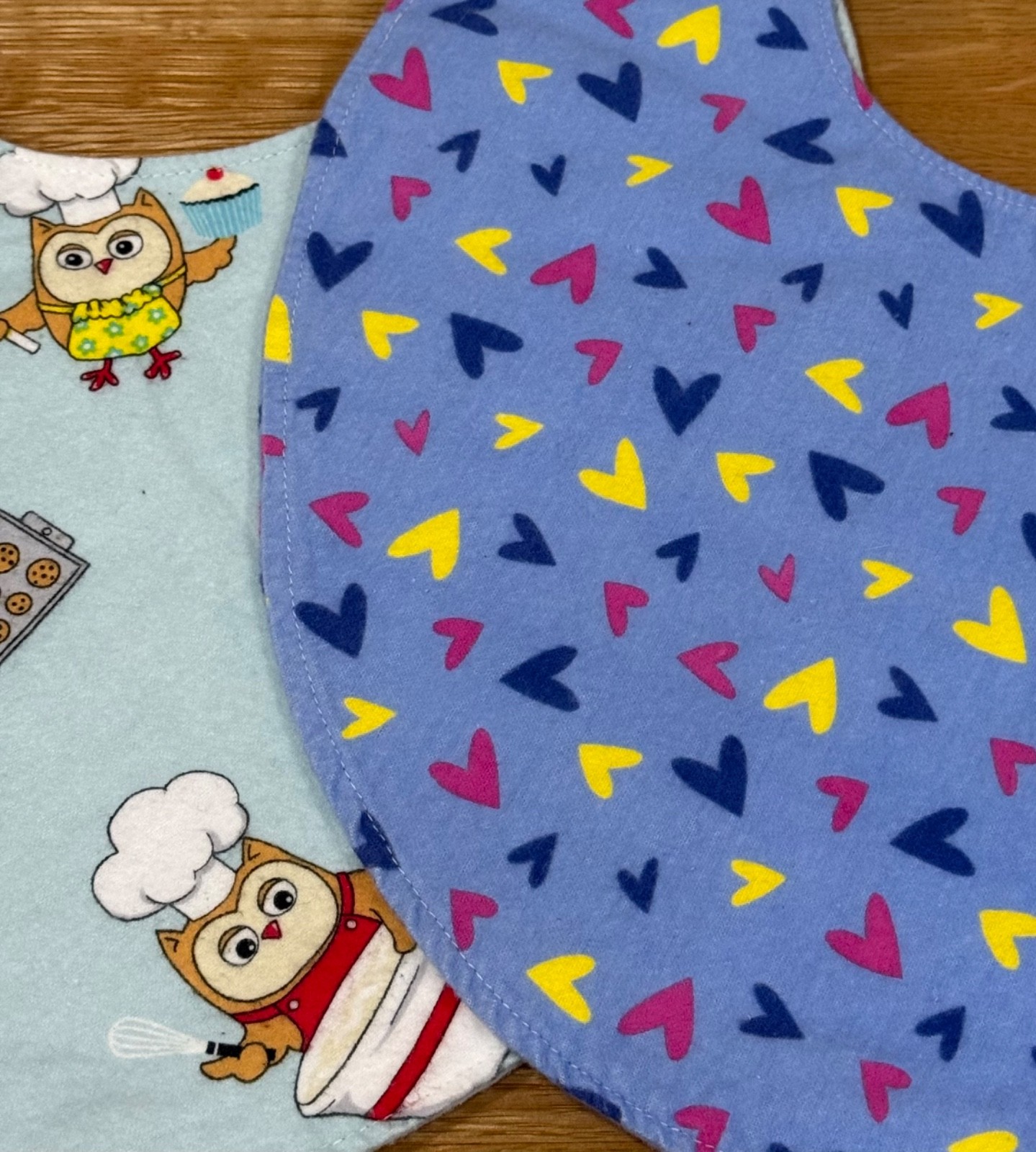 2 HANDMADE LARGE TODDLER SMALL ADULT BIBS - HEARTS AND COOKING OWL PATTERN
