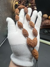 China Olive Dentoliva Hand Carved  with Ten Thousand Buddhas 橄榄核手工雕刻王佛朝宗手持