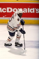 Mike Grier Edmonton Oilers skates on the ice at an NHL game - Ice Hockey Photo 5