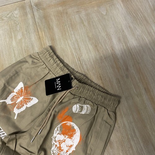 Herren Cargohose beige groß Graffiti bedruckt Hose Stein Boohoo Mann UVP £50 - Bild 2 von 12