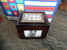 wood photo box with photos on all sides  inside are mini albums