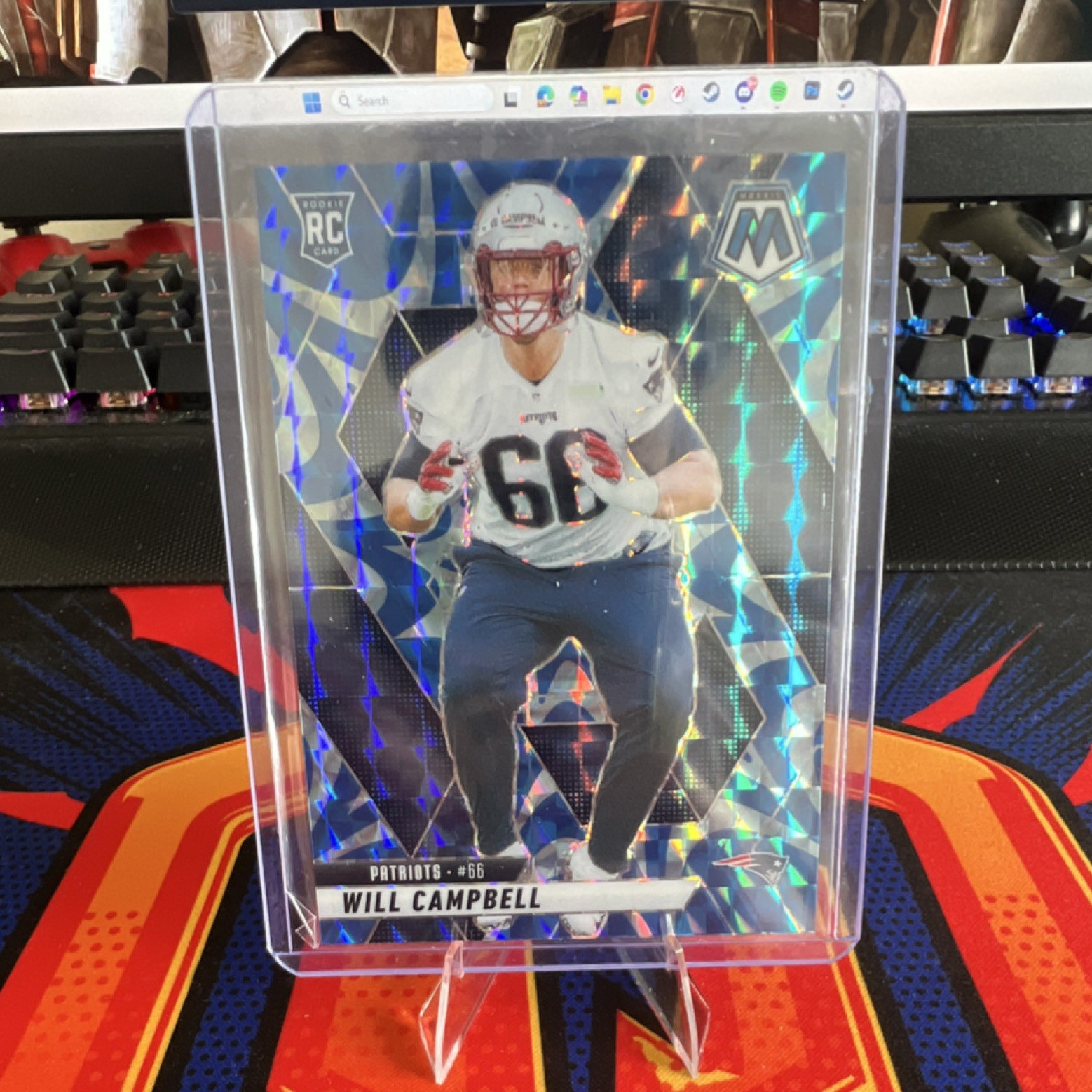 2025 Panini Mosaic Will Campbell Rookie Reactive Blue Mosaic Prizm #378 Patriots