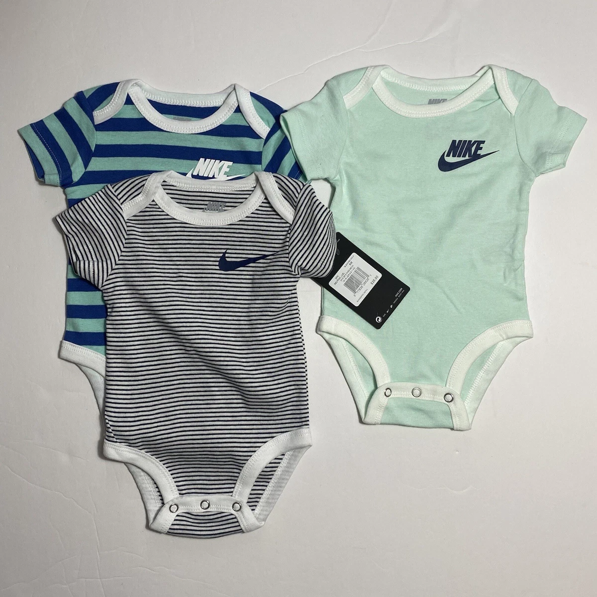 Baby onesies hotsell nike