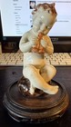 An Antique Max Heinz Majolica Figure Of An Child on a Chinese Stand