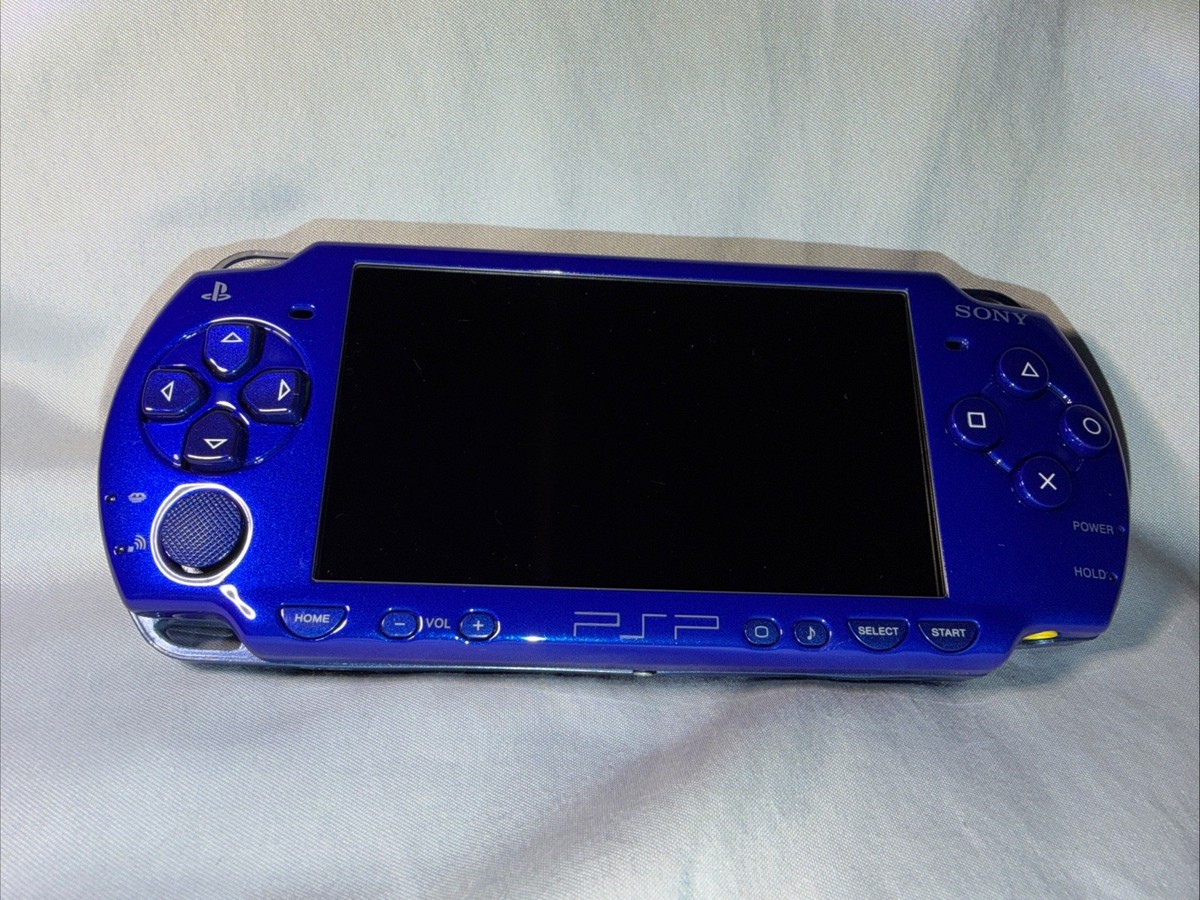 Sony PSP-2000 (Royal Blue) w/Charger + New Battery Games Included
