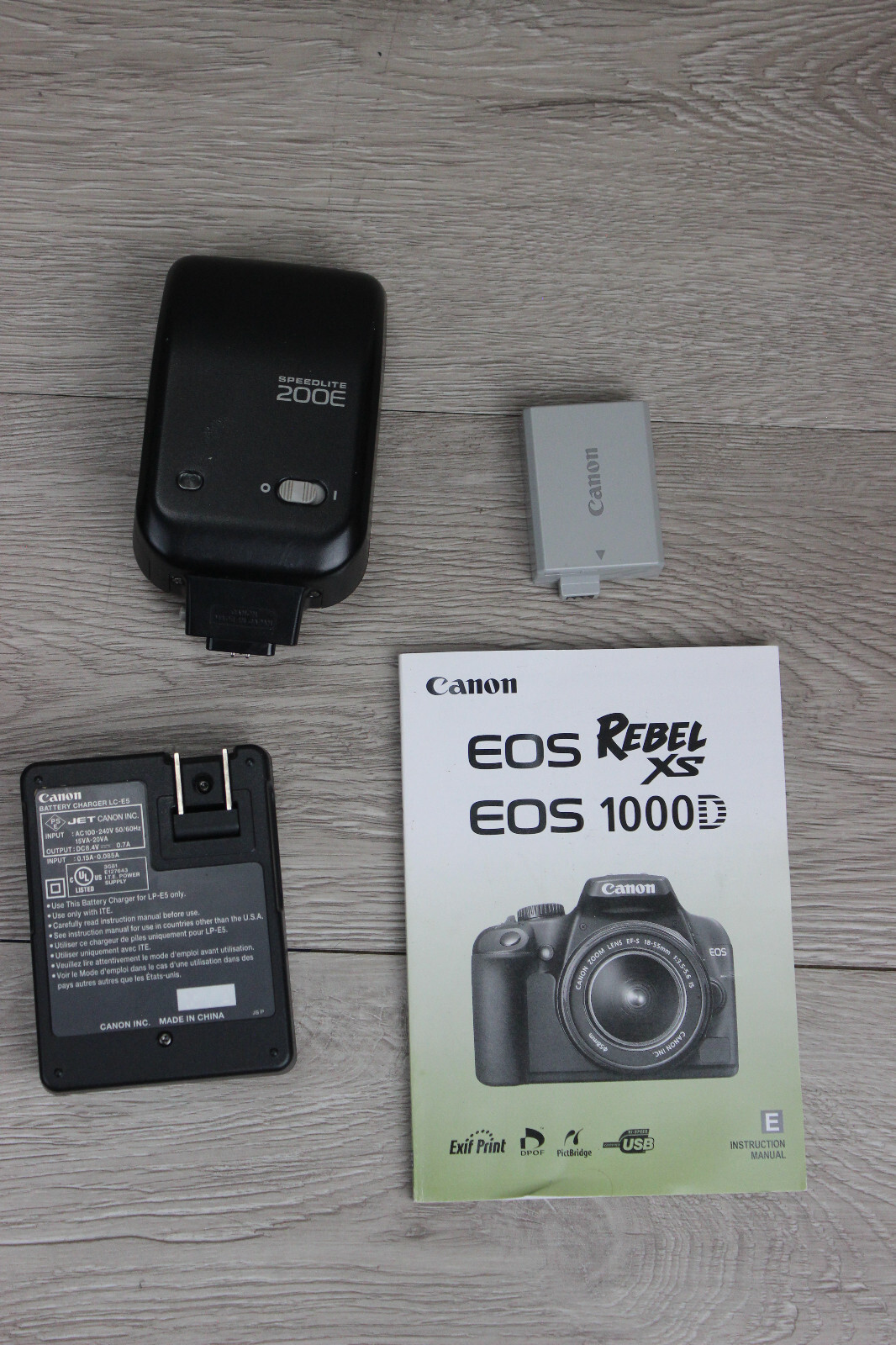 Canon EOS Rebel XS 1000D Digital SLR Camera Includes 3 lenses Shutter