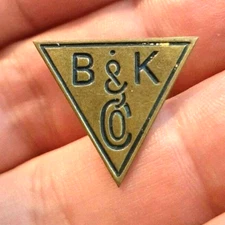 B&K Co Triangle Metal Vintage pinback had a very successful go at it