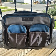 Eddie Bauer navy and gray diaper travel bag with multiple pockets