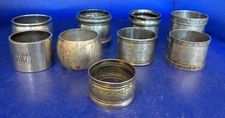 Nine Assorted Antique Silverplated Napking Rings - Plain and Aesthetic Movement