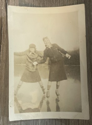Vintage Photo Of Two Girls Ice skating On The Lake 