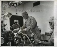 1968 Press Photo Dr. William Green takes specimens from a chimp - noa64069