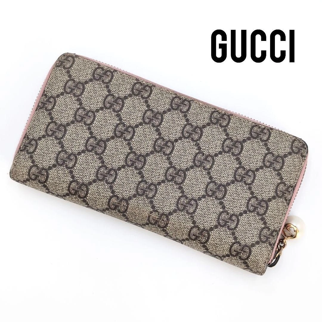 Portefeuille Gucci GG Supreme en cuir pivoine beige longue fermeture éclair occasion