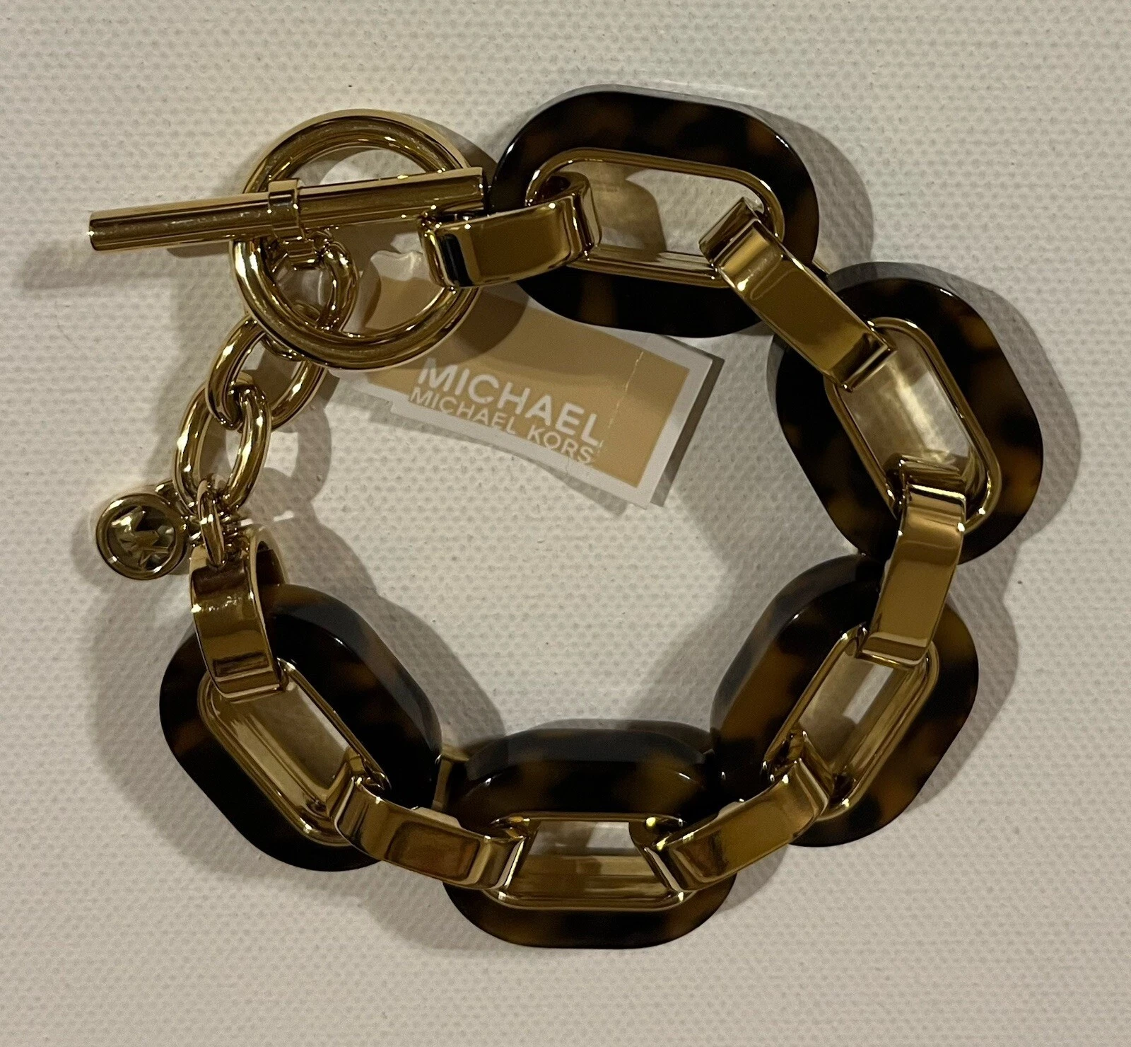 Bracciale Michael Kors grosso tono oro e maglia tartaruga NUOVO RARO DICHIARAZIONE PZ.
