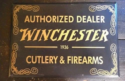 VINTAGE WINCHESTER FIREARMS CUTLERY DEALER 1936 TIN OVER CARDBOARD SIGN GAS OIL