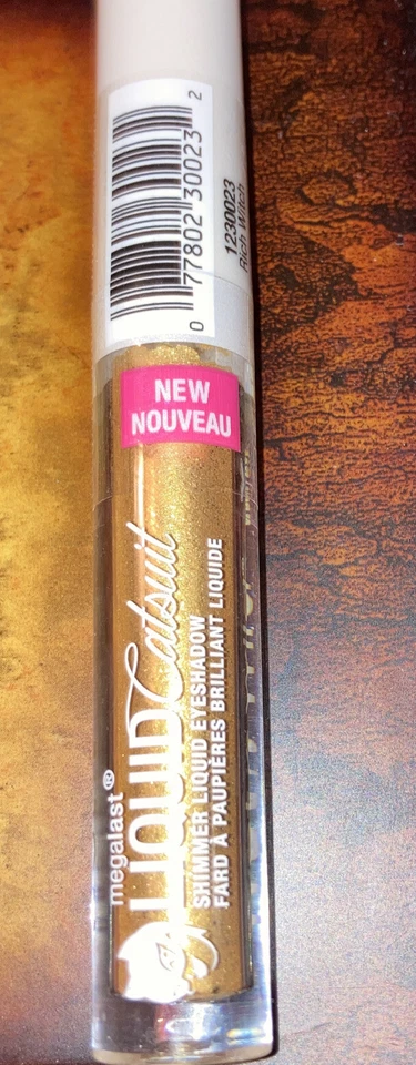 Traje de gato líquido Wet n Wild Megalast dorado brillo sombra de ojos ojo de bruja rico brillo Foto 2 de 2