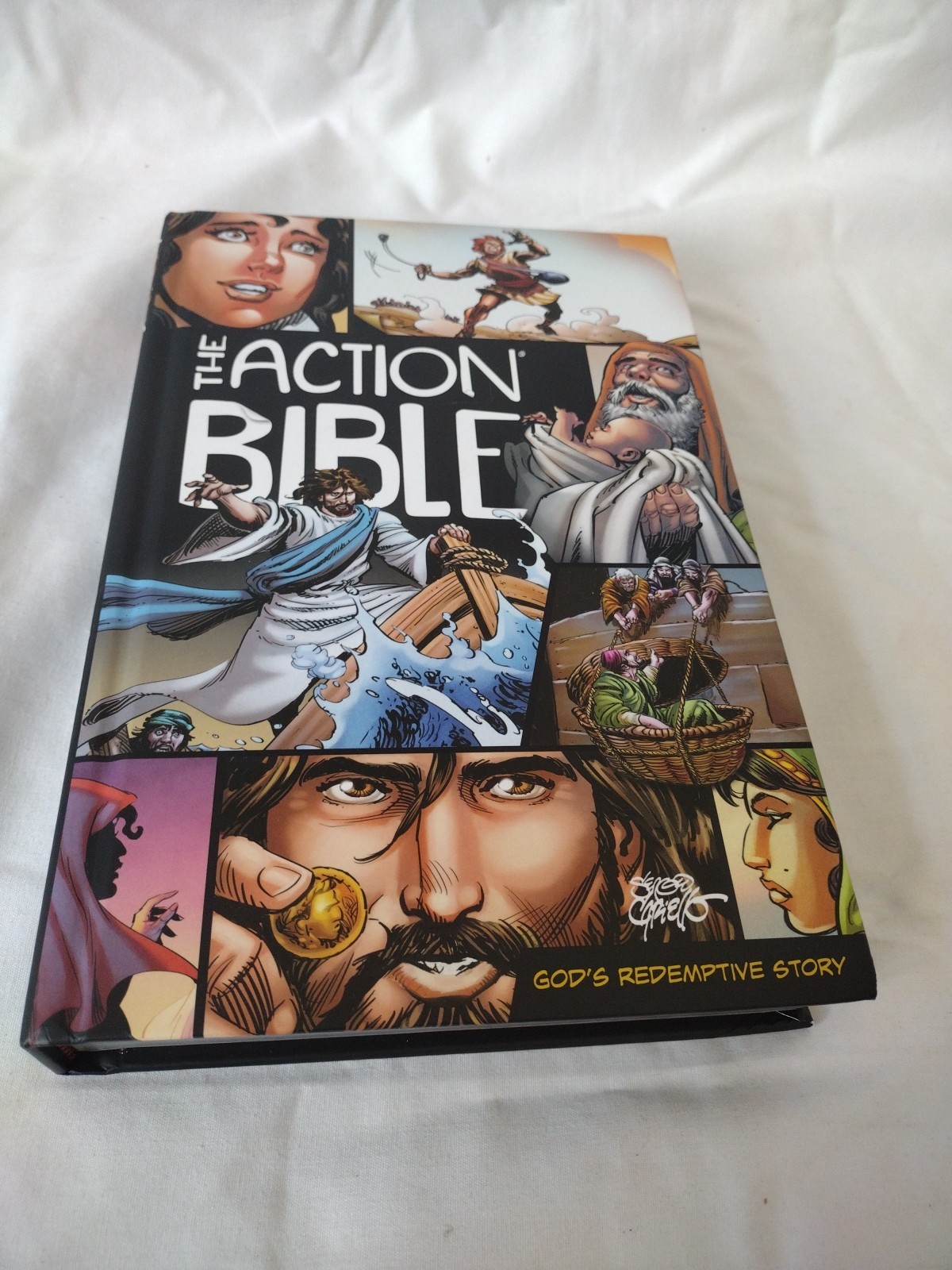 The Action Bible: God's Redemptive Story (Picture Bible) by Doug Mauss HB VGC