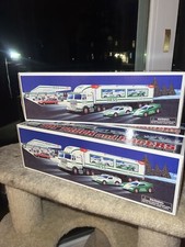 1997 HESS "TOY TRUCK AND RACERS" New,Unopened IN BOX WITH 2 CAR STYLE RACE CARS