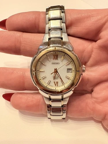Vintage Seiko Ladies Solar Two Tone White Date Dial Dress Watch, 100m works!