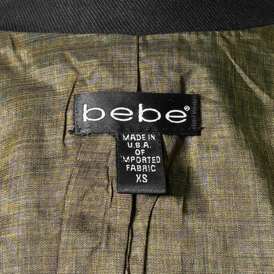 Chaqueta de Moto Bebe XS Negra Elastizada Asimétrica Cremallera Completa Frontal Recortada Foto 3 de 4