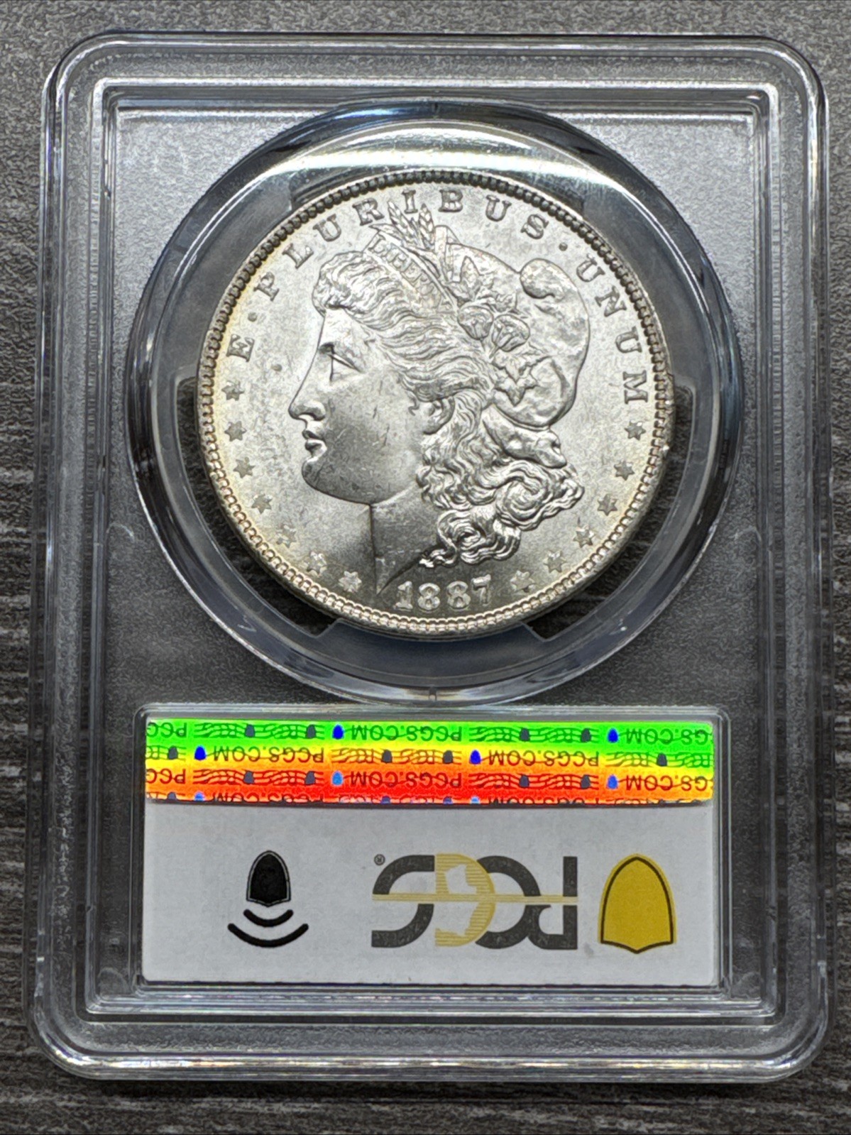 1887 PCGS MS65 -Bright Rainbow Reverse Toner VAM 35 Morgan Silver Dollar