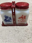 VINTAGE MILK GLASS SALT & PEPPER SHAKERS W/DUTCH & METAL HOLDER