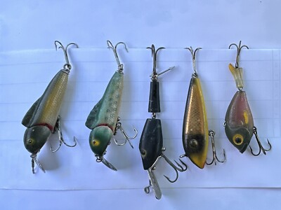 Fishing Lures Displayed in Retail Packaging on a Store Shelf Editorial