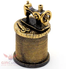 Brass Thimble with an old Sewing Machine lid on a magnet IronWork