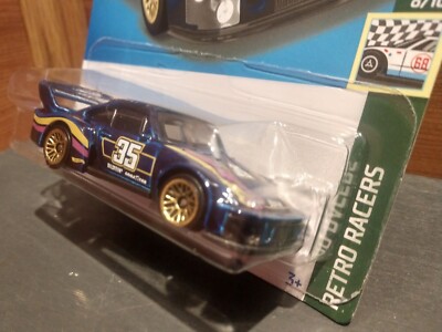 Hot Wheels Porsche 935 - Modellino Retro Racers, Scala 1:64, Edizione Limitata, Con Grafica Bilstein/Goodyear - Foto 3
