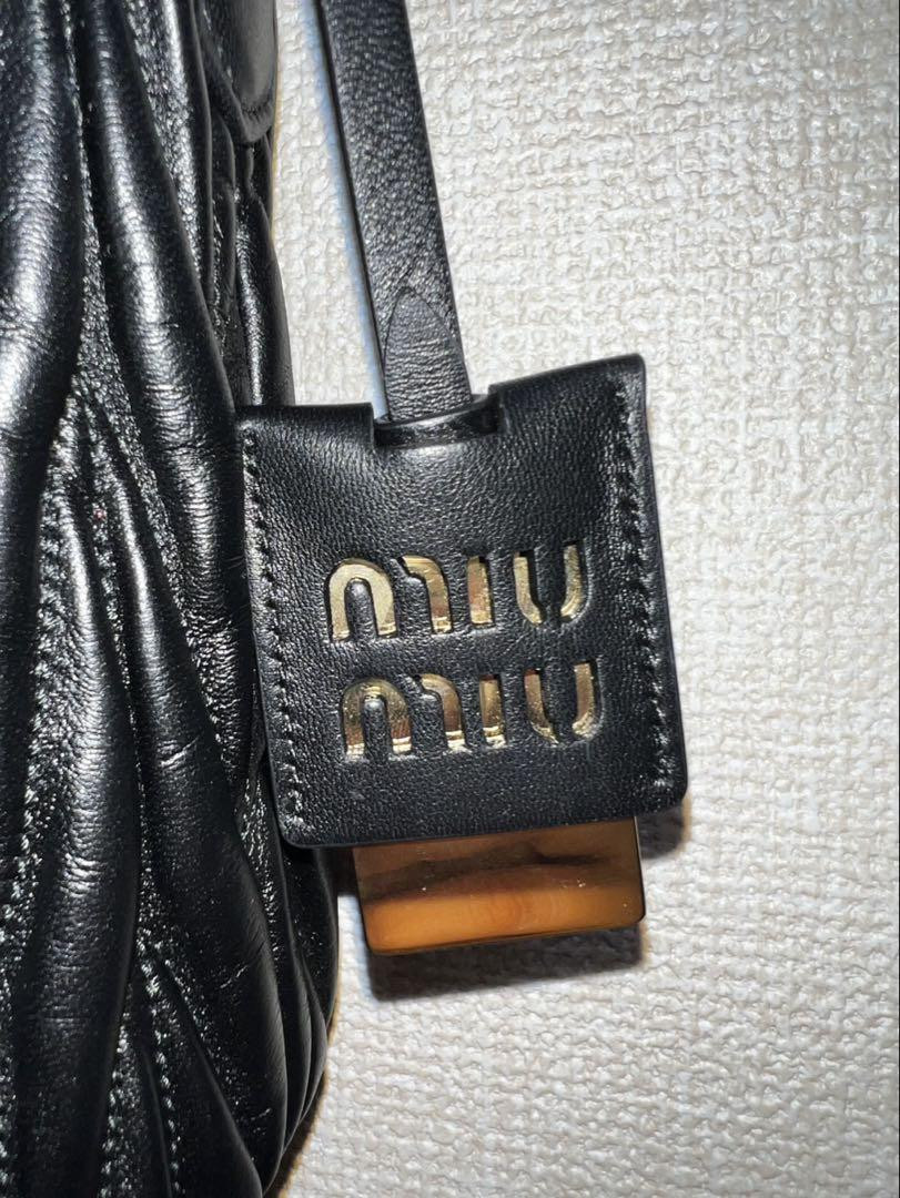 miumiu black leather bag in good condition, no stains or