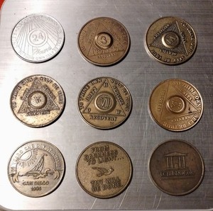 COLLECTION OF AA SOBRIETY TOKENS - VARIETY OF DESIGNS - 18 TOTAL