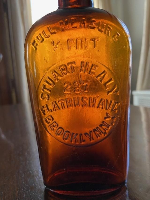 Stuart Healy 287 Flatbush Ave, Brooklyn, N.Y. Amber 1/2 Pint Whiskey ...