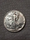 1942 Walking Liberty Half Dollar In Fine To VF Condition In My Opinion. #403