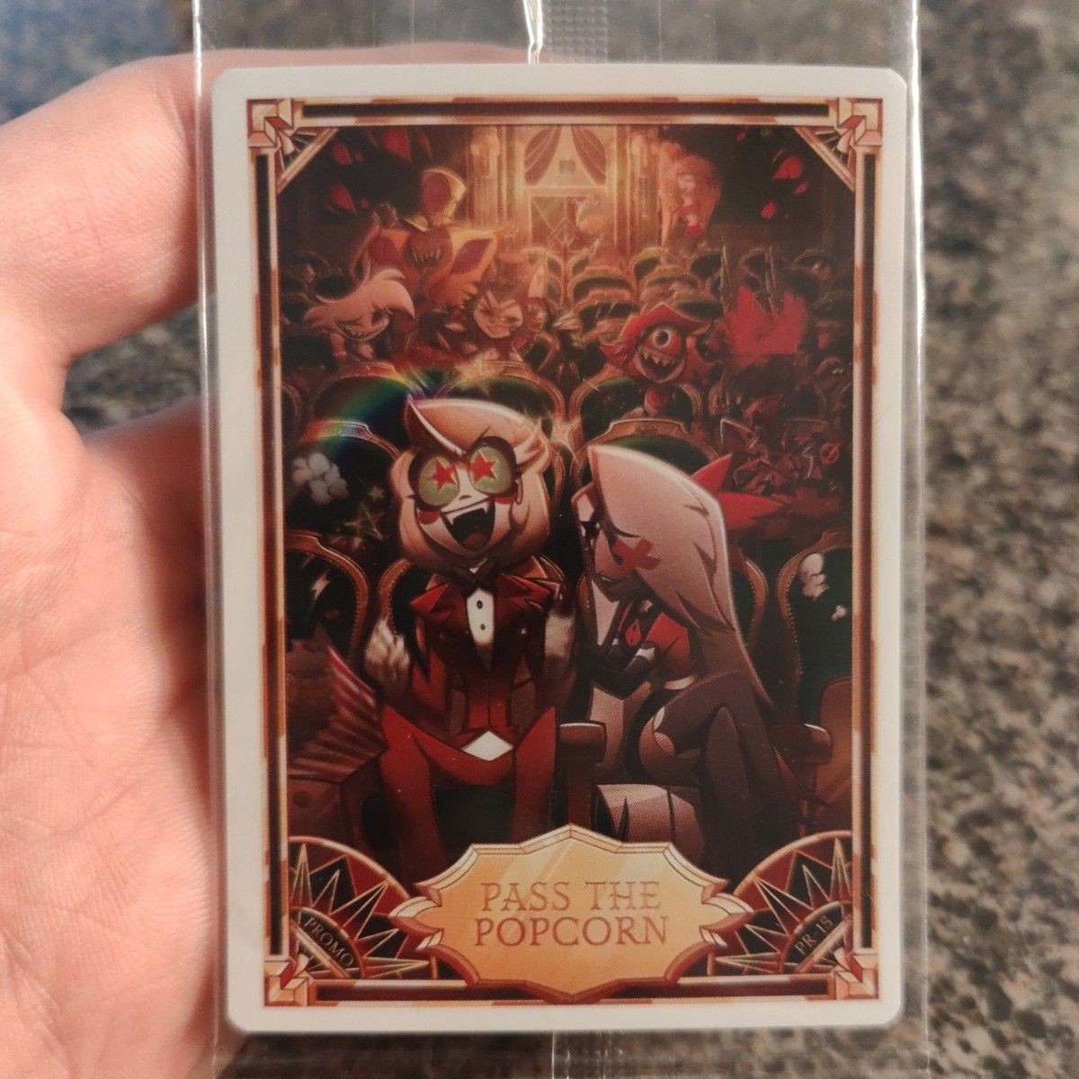 THEHOOPERS ポストカード Hazbin Hotel Pass The Popcorn PROMO Foil Card (PR-15) - Sing Along
