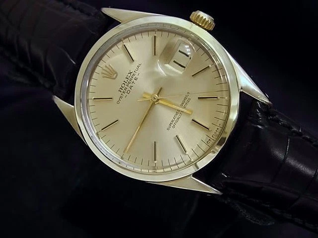 Reloj Rolex Date 1550 para hombre con carcasa de oro de 14 quilates correa de cuero negro esfera champán