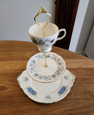 3 tier china cake stand made from vintage plates with multi coloured florals