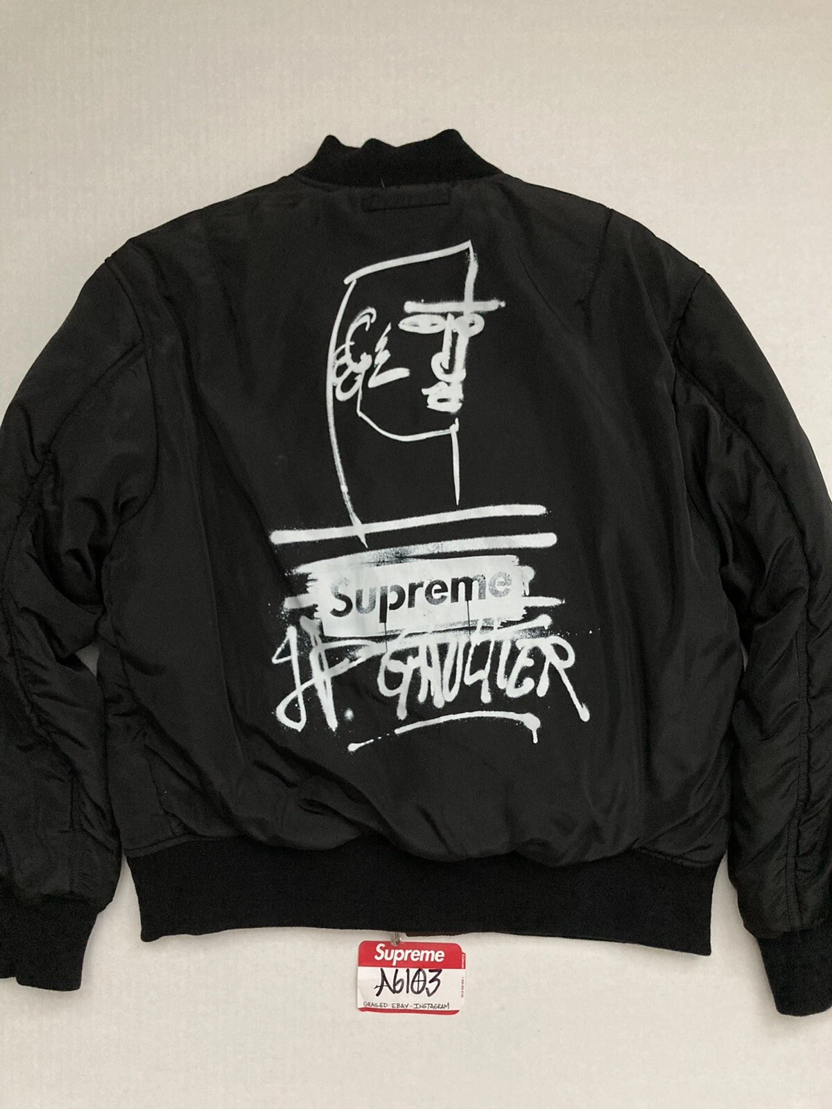 Veste graffiti noir marron Supreme jean paul gaultier ma1 2019 petit vintage Y2K
