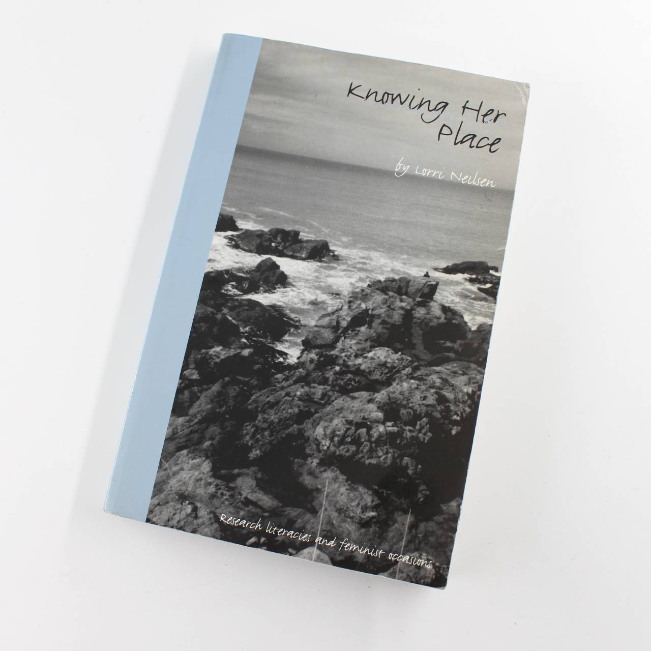 Knowing Her Place: Research Literacies and Feminist Occasions book by Lorri Neil