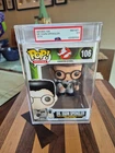 Funko Pop! Ghostbusters: Dr Egon Spengler #106.  Graded PSA 8.5