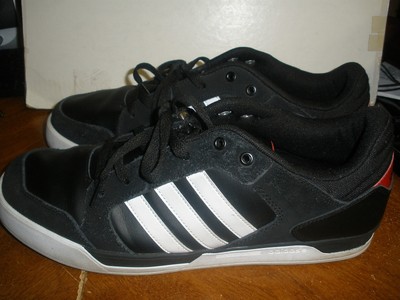 adidas black sneakers with white stripes