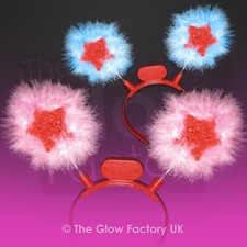 Fluffy star headboppers with red flashing LED stars and pink or blue trim lot