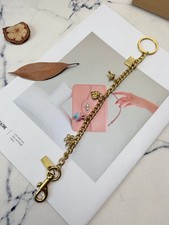 NWT Motif Chain Bag Charm In Metal Brass