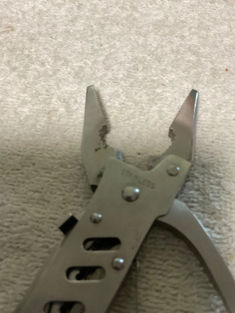 MULTI-TOOL WITH HOLDER. STAINLESS