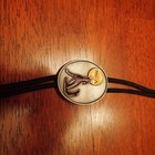 bolo tie MCA RECORDS CLOTH ROPE CAST PAINTED STEEL ENDS 16 INCHS LONG 39 GRAMS — photo 2