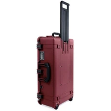 Oxblood & Black Pelican 1615 Air case.  Comes empty.