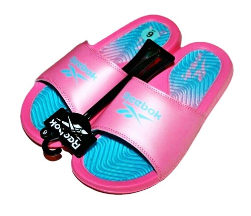 pink reebok slides