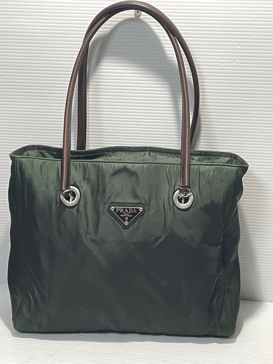 Prada Leather Nylon Triangular Handle Backpack Kh… - image 1